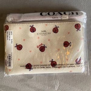📦📦SOLD 📦📦Coach Ladybug Wristlet
